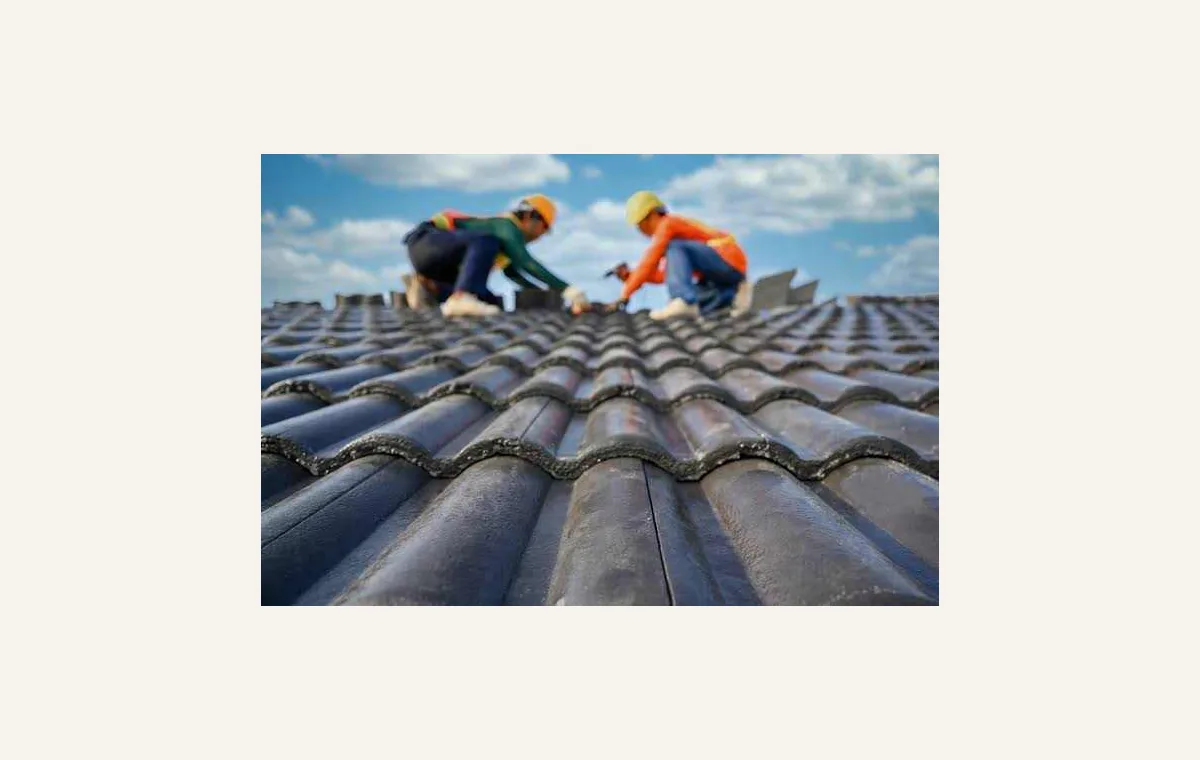 Concrete tile roof surface with rows of roofing tiles